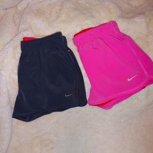 2 pairs Nike running shorts